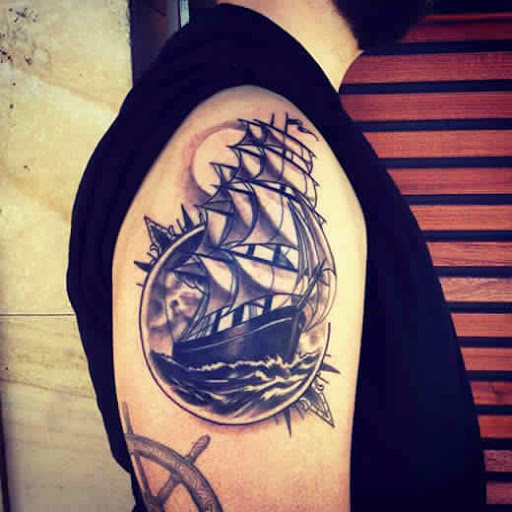 Ship Tattoo On Man Right Shoulder