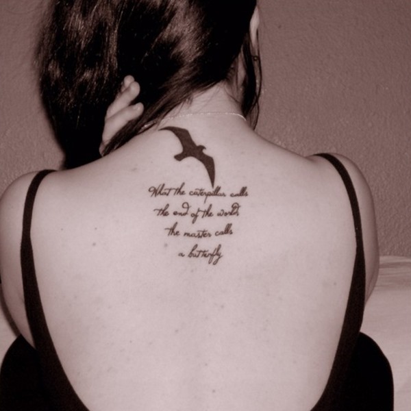 Silhouette Flying Bird Tattoo On Girl Upper Back