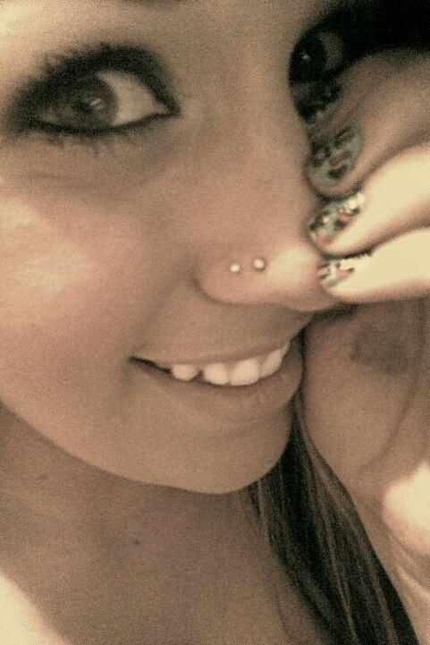 Silver Studs Double Nose Piercing Picture