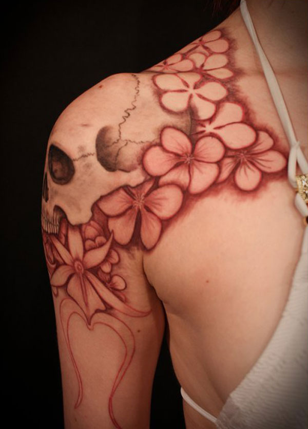 Skull And Flowers Tattoo On Shoulder For Girls