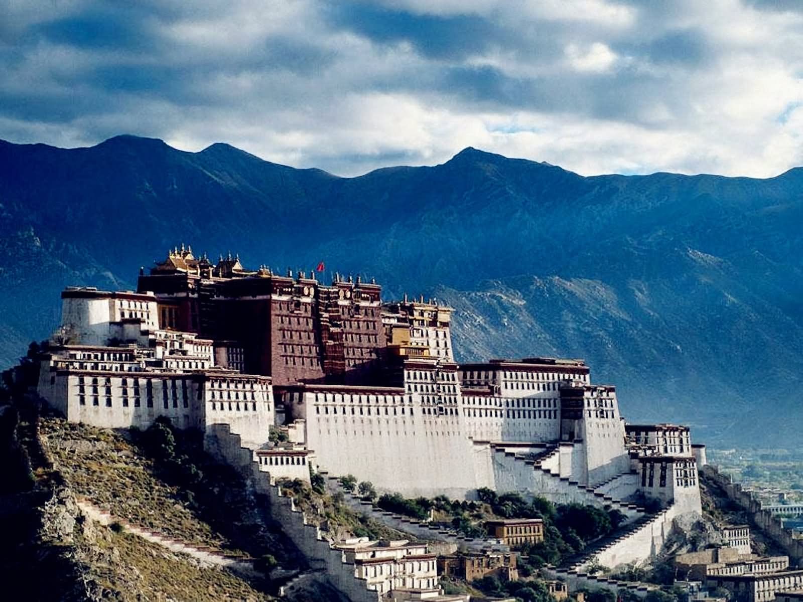 The Potala Palace On The Bank Of Lhasa River In Tibet