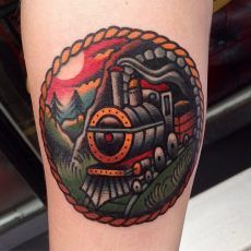 Traditional Freight Train In Rope Frame Tattoo Design For Arm By Luke Jinks