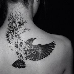 Unique Black Flying Bird Tattoo On Girl Upper Back