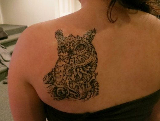 Unique Owl Tattoo On Girl Upper Side Back