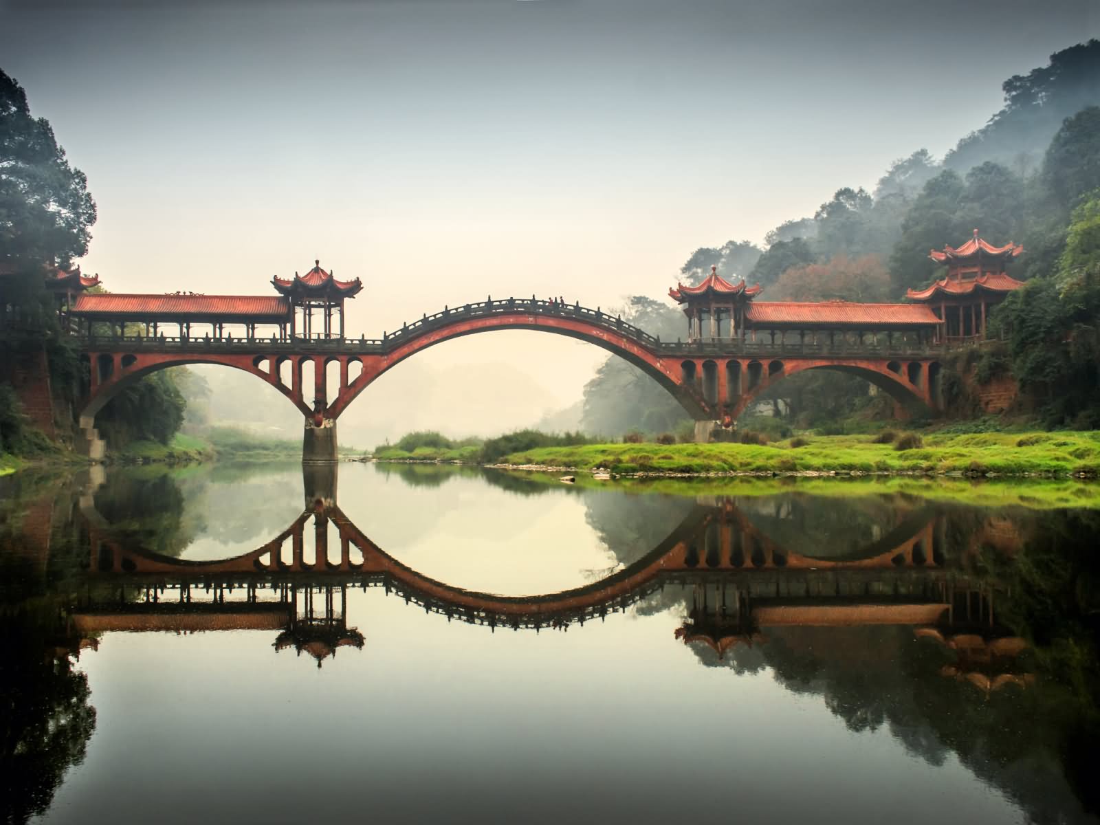 Water Reflection Of Leshan Giant Buddha Bridge, China