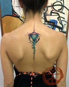 Watercolor Triangle In Circle Tattoo On Girl Upper Back