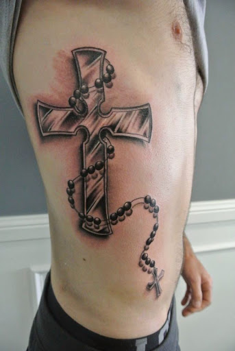 3D Cross With Rosary Cross Tattoo On Man Right Side Rib