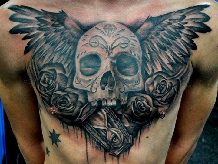 3D Sugar Skull With Roses And Wings Tattoo On Man Chest