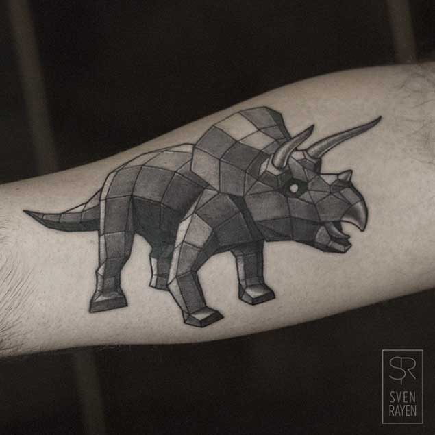 Abstract Geometric Dinosaur Tattoo On Arm