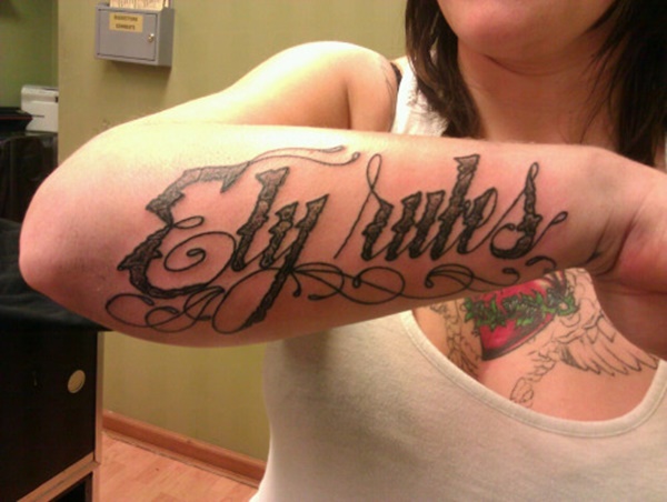 Amazing Ely Rules Tattoo On Girl Right Forearm