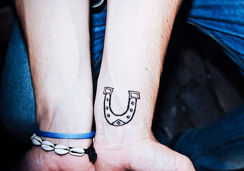 Amazing Horseshoe Tattoo On Left Wrist