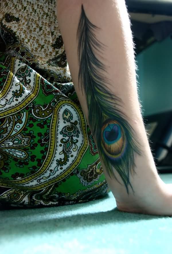 Amazing Peacock Feather Tattoo On Left Forearm