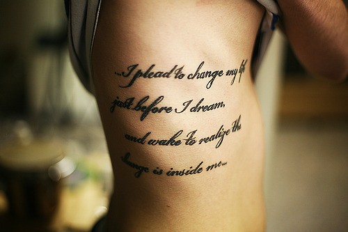 Amazing Quote Tattoo On Right Side Rib