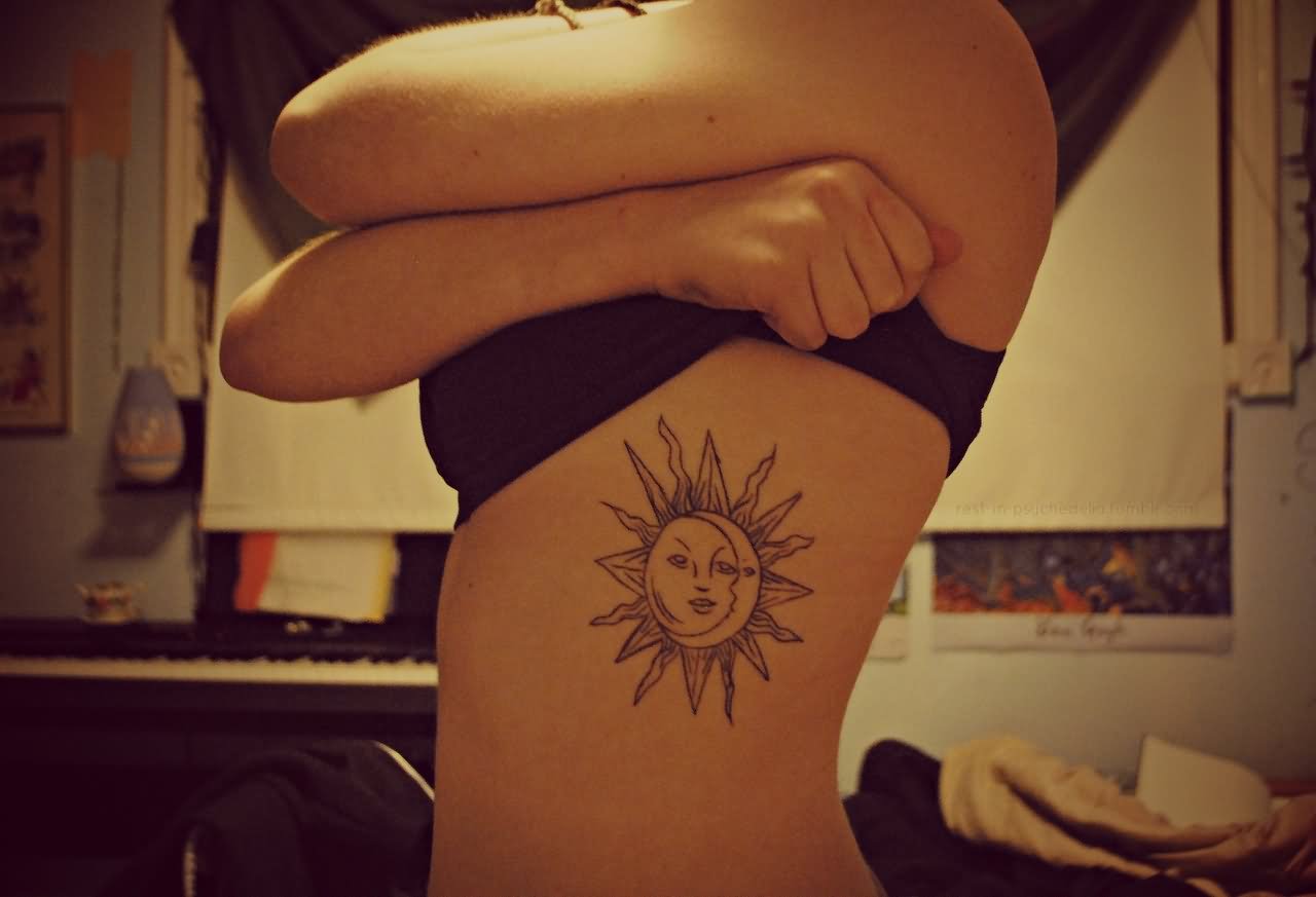 Amazing Sun With Moon Tattoo On Girl Left Side Rib