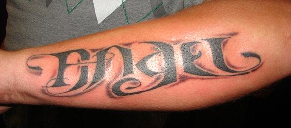 Angel Word Tattoo On Right Forearm