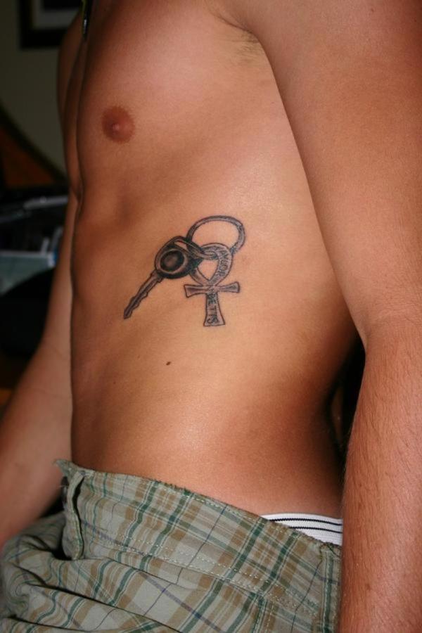 Ankh Key Chain Tattoo On Man Left Side Rib