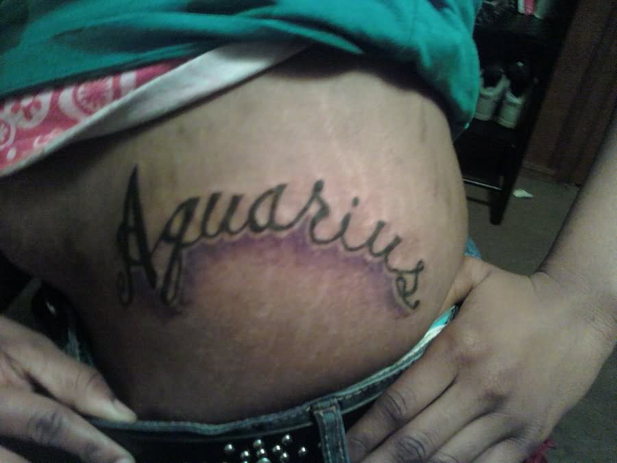 Aquarius Tattoo On Side Rib