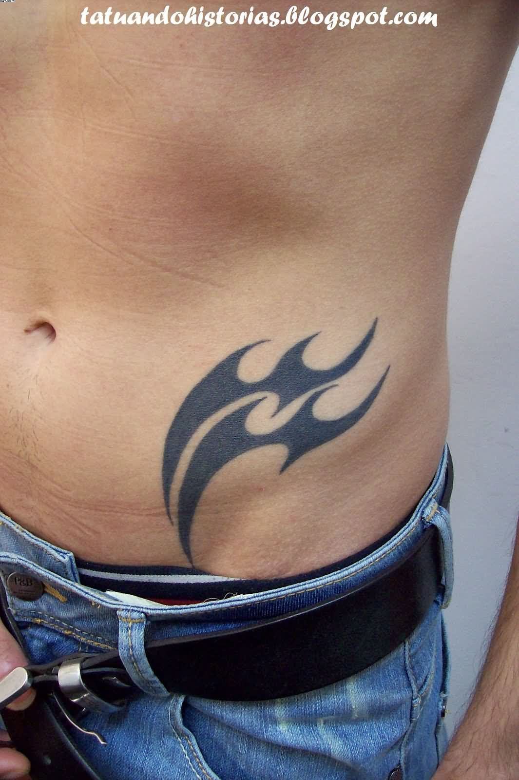 Aquarius Tribal Tattoo On Hip