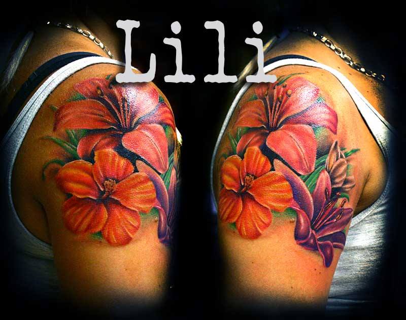 Attractive Colorful Hibiscus Flowers Tattoo On Shoulder