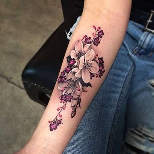 Attractive Flowers Tattoo On Forearm
