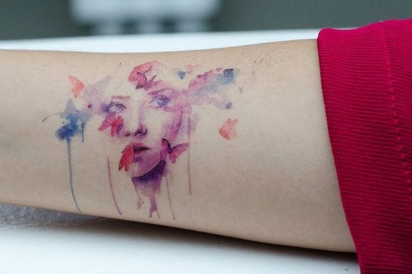 Attractive Watercolor Girl Face Tattoo Design For Forearm