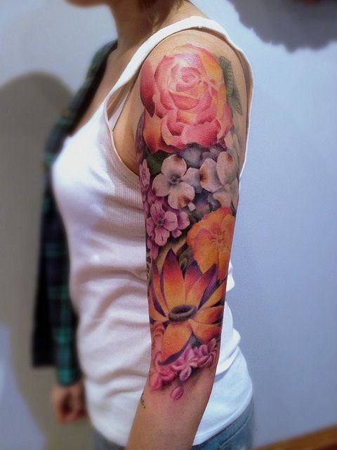 Beautiful Colored Flowers Tattoos On Half Sleeve