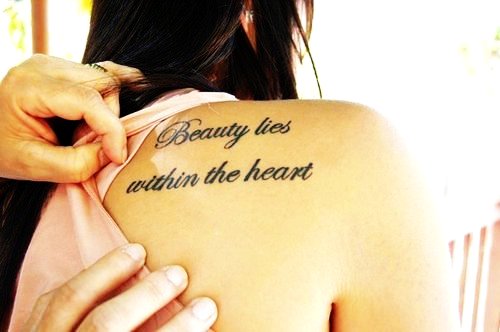 Beauty Lies Within The Heart Quote Tattoo On Right Back Shoulder