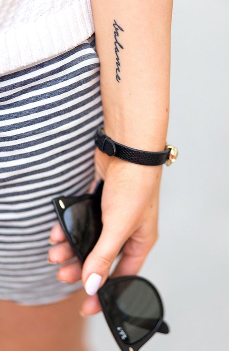Believe Word Tattoo On Girl Left Forearm