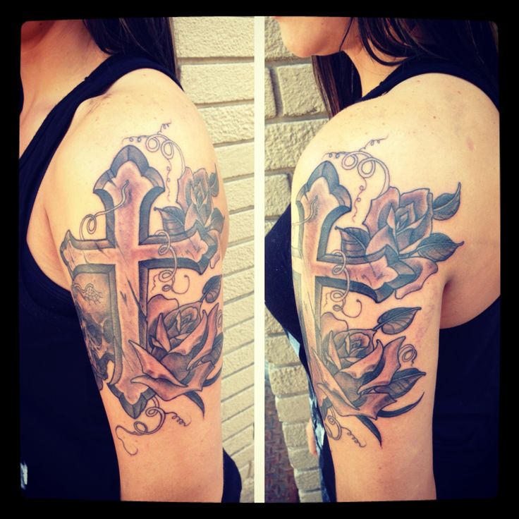 Black And Grey Cross With Rose Tattoo On Girl Left Half Sleeve