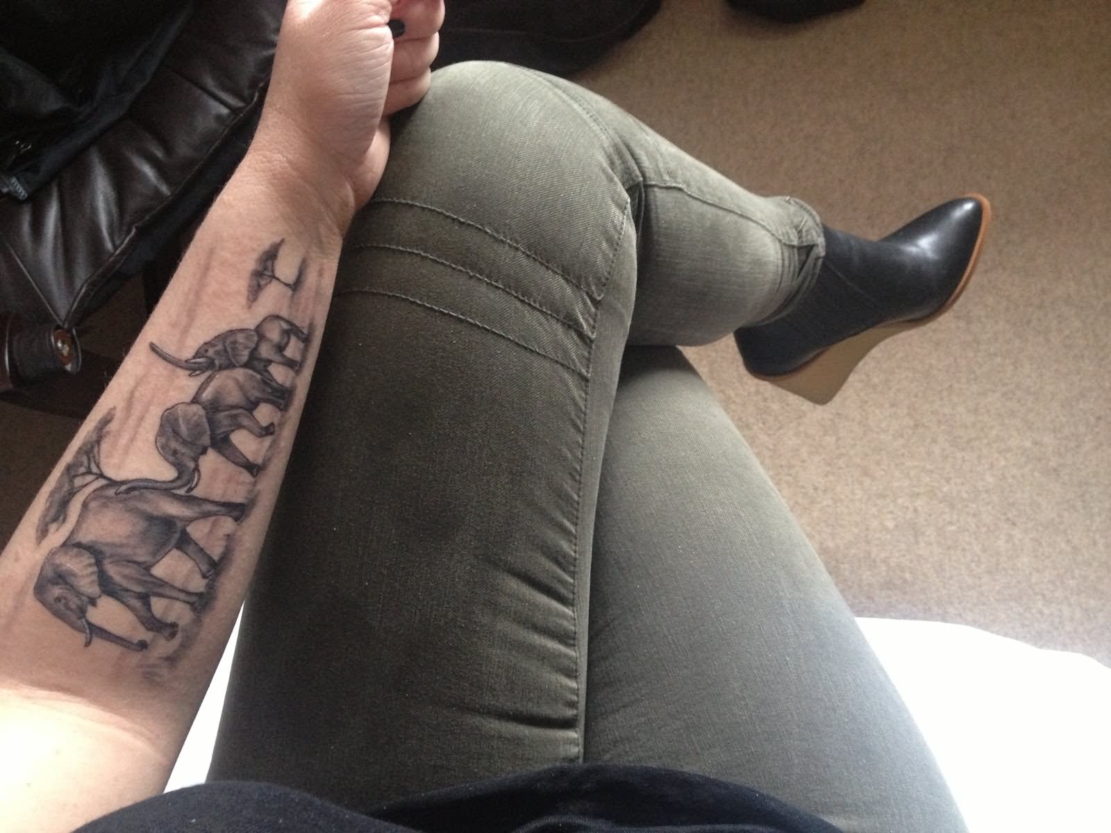 Black And Grey Elephant Family Tattoo On Left Forearm