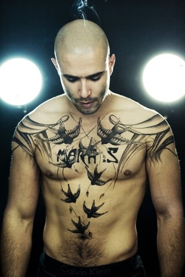 Black And Grey Flying Birds Tattoo On Man Chest