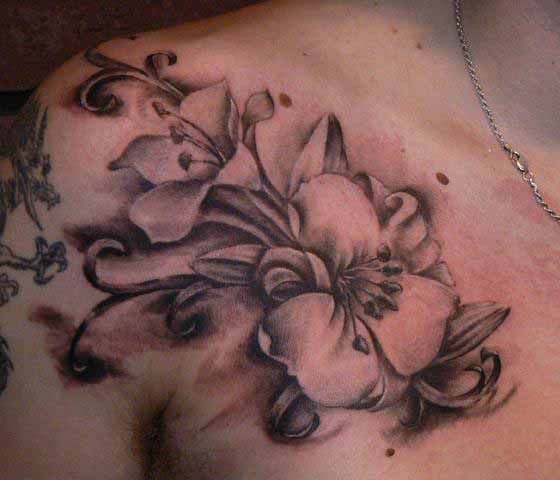 Black And Grey Hibicus Flower Tattoo On Man Right Front Shoulder