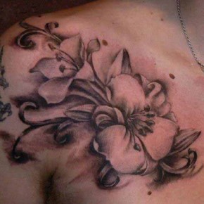 Black And Grey Hibiscus Flowers Tattoo Design For Front Shoulder