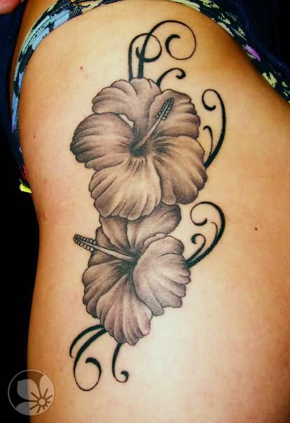Black And Grey Hibiscus Flowers Tattoo On Girl Side Rib