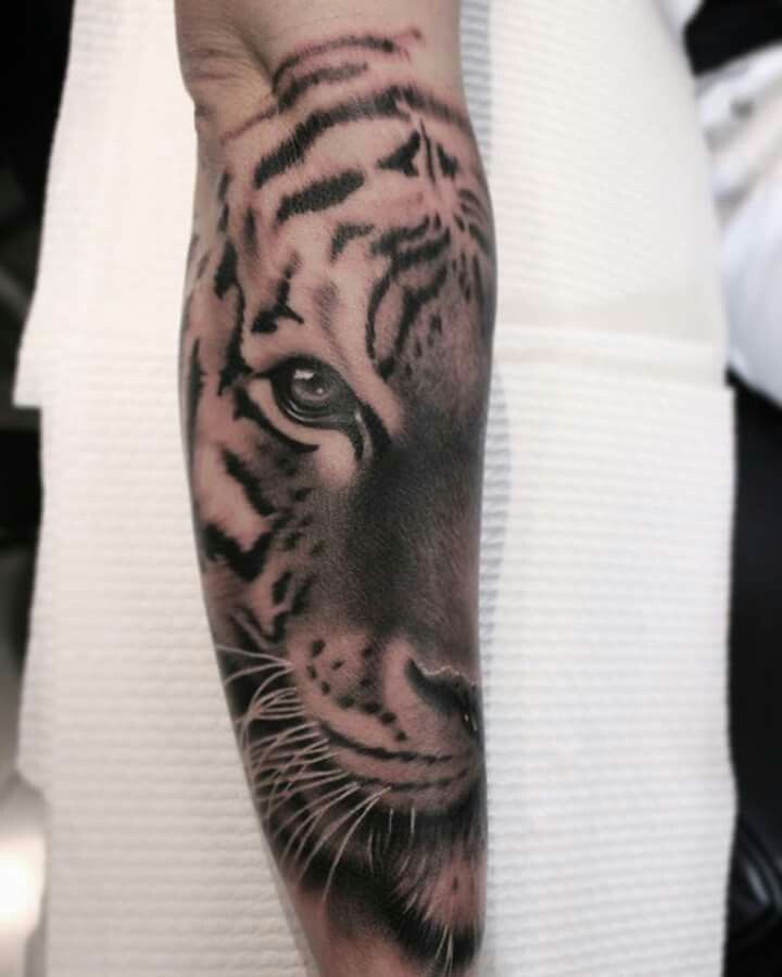 Black And Grey Tiger Tattoo On Forearm