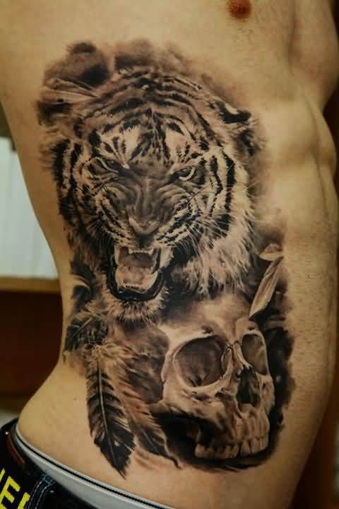 Black And Grey Tiger With Skull Tattoo On Man Right Side Rib