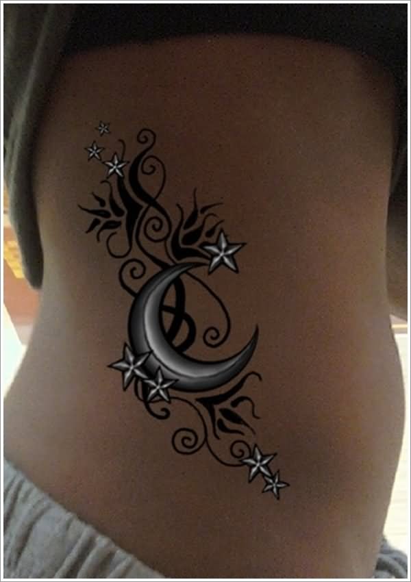 Black And White Half Moon With Stars Tattoo On Side Rib