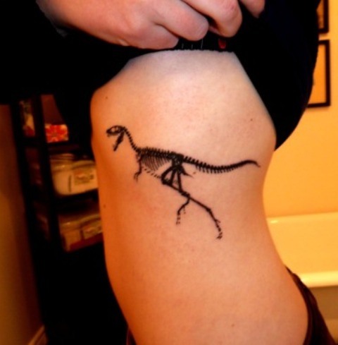 Black Dinosaur Skeleton Tattoo On Side Rib