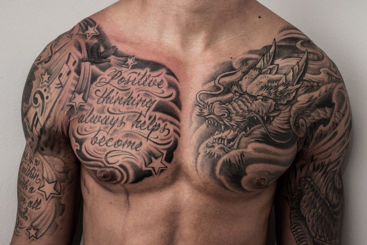 Black Ink Clouds With Quote And Dragon Tattoo On Man Chest