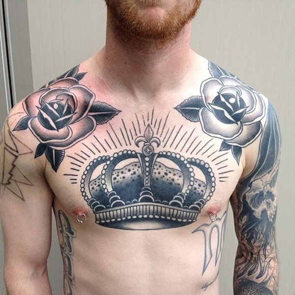 Black Ink Crown With Tattoo Roses Tattoo On Man Chest