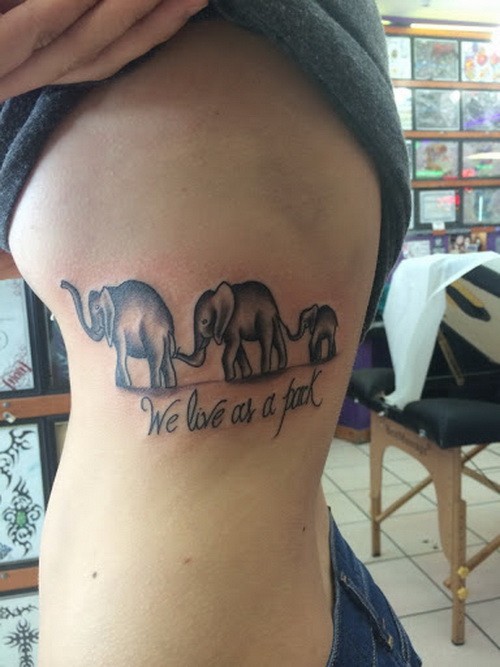 Black Ink Elephant Family Tattoo On Side Rib