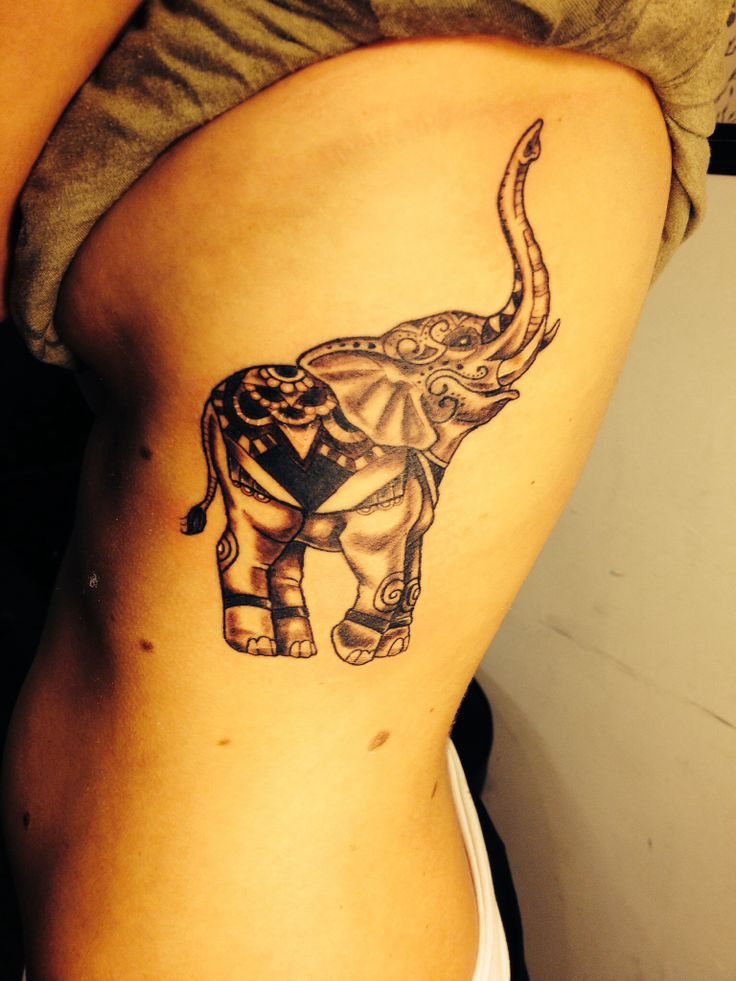 Black Ink Elephant Tattoo On Girl Side Rib