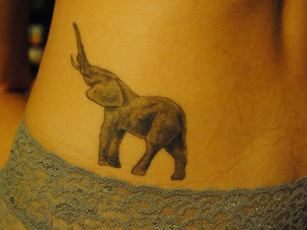 Black Ink Elephant Trunk Up Tattoo Design For Side Rib