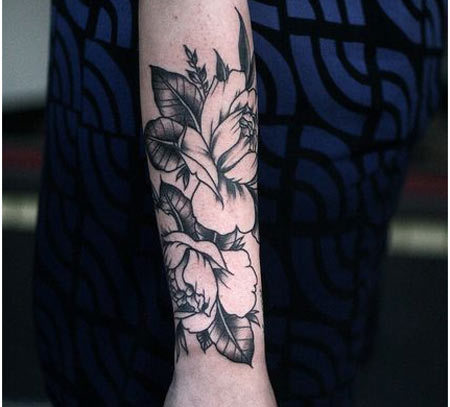 Black Ink Flowers Tattoo On Forearm