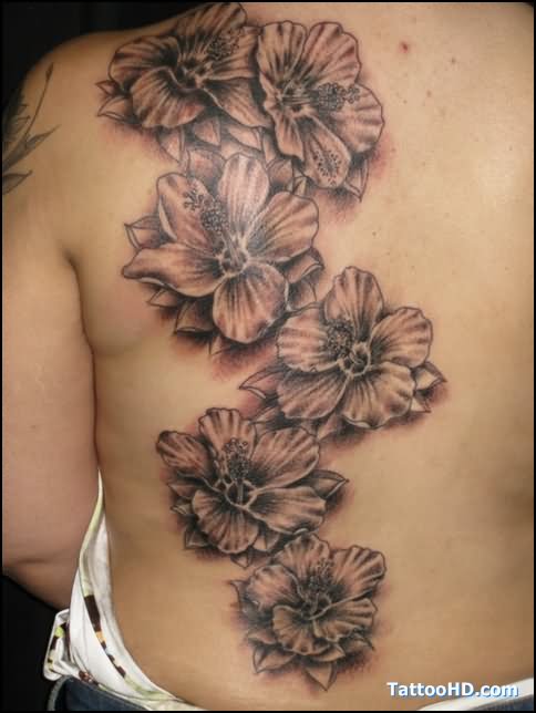Black Ink Hibiscus Flower Tattoo On Full Back