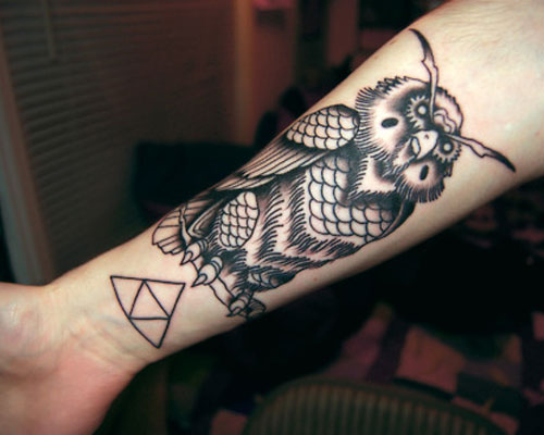 Black Ink Owl Tattoo On Right Forearm