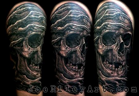 Black Ink Skull Tattoo Design For Half Sleeve