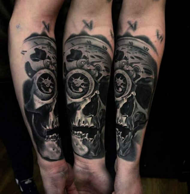 Black Ink Skull Tattoo On Forearm