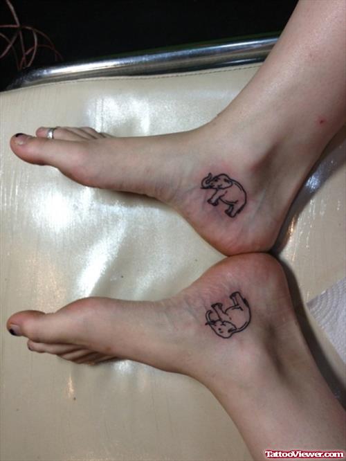 Black Outline Elephant Tattoo On Both Ankle