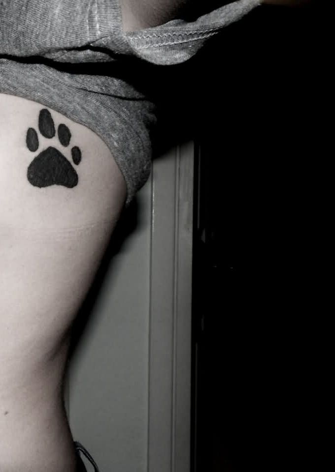 Black Paw Print Tattoo On Side Rib